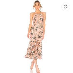 Embodied dress in blush by NBD. Perfect for a special event